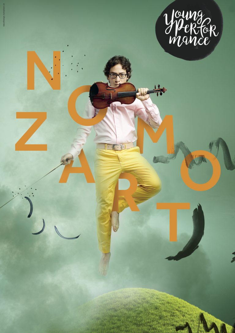 NOMOZART production poster with Jeffrey Young apparently suspended in thin air among the letters NOMOZART, holding his violin in front of his face and the bow off to the side, with a green background and clouds over a green hill, and the Young Performance logo in the upper right corner